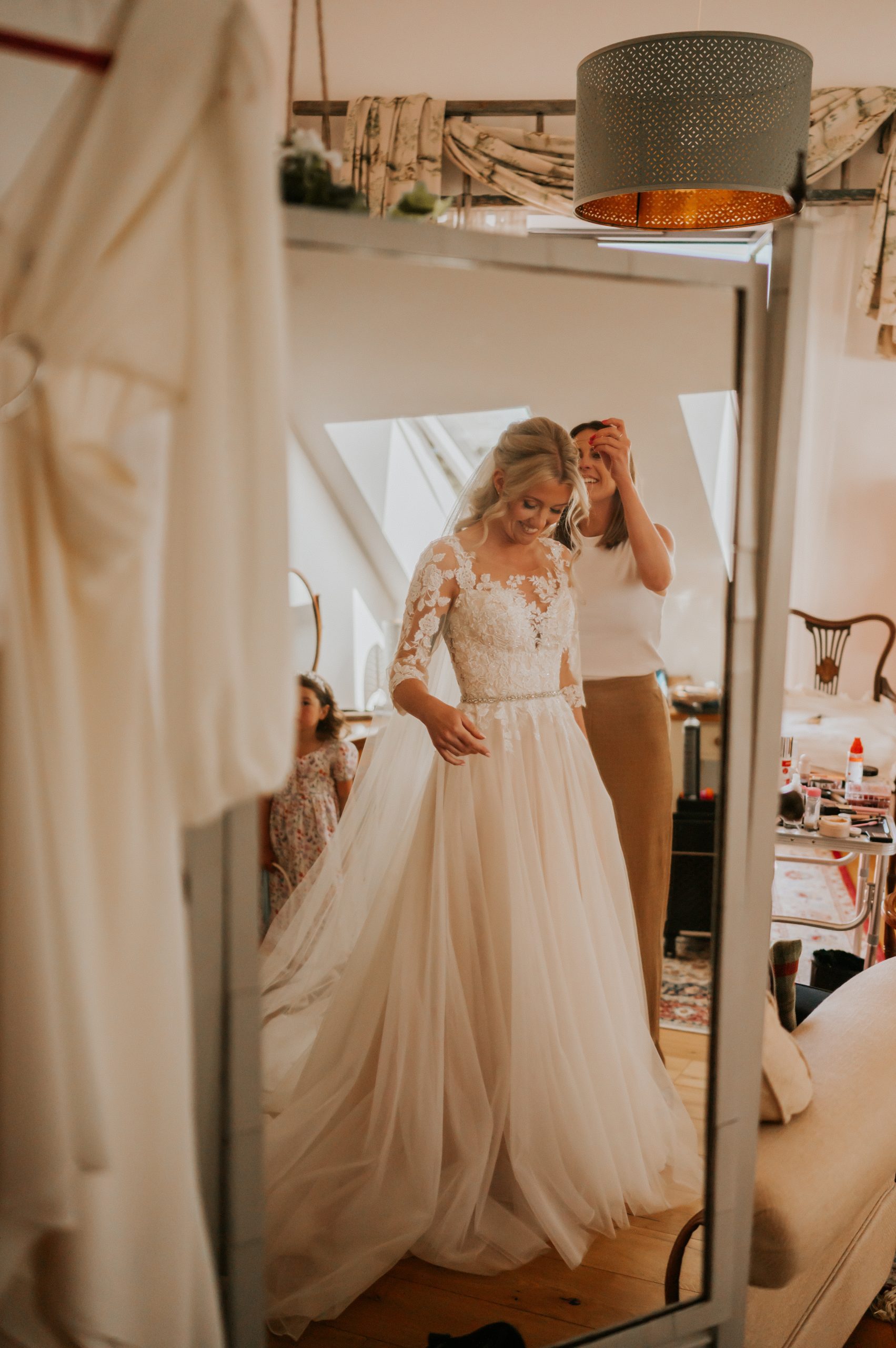 Charlotte preparing in the bridal suits