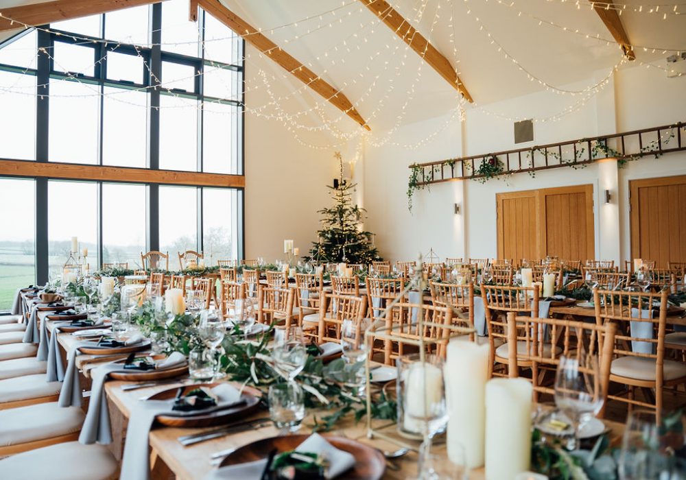 Tables at a Christmas wedding at Harefield Barn wedding venue Devon